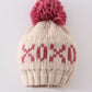Cream XOXO knit beanie pom pom hat