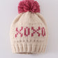 Cream XOXO knit beanie pom pom hat