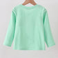Green parade embroidery top