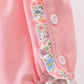 Pink floral cross embroidery ruffle bubble