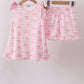 Pink bow print scalloped ruffle shorts set