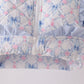 Sky floral bow ruffle vest
