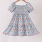 Blue floral smocked ruffle dress
