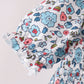 Blue floral smocked ruffle dress