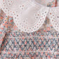 Floral smocked lace dress