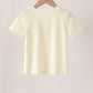 Beige character french knot top