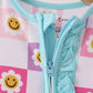 Blue smiling checkered ruffle bamboo romper