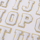 White letters "A-Z" stickers