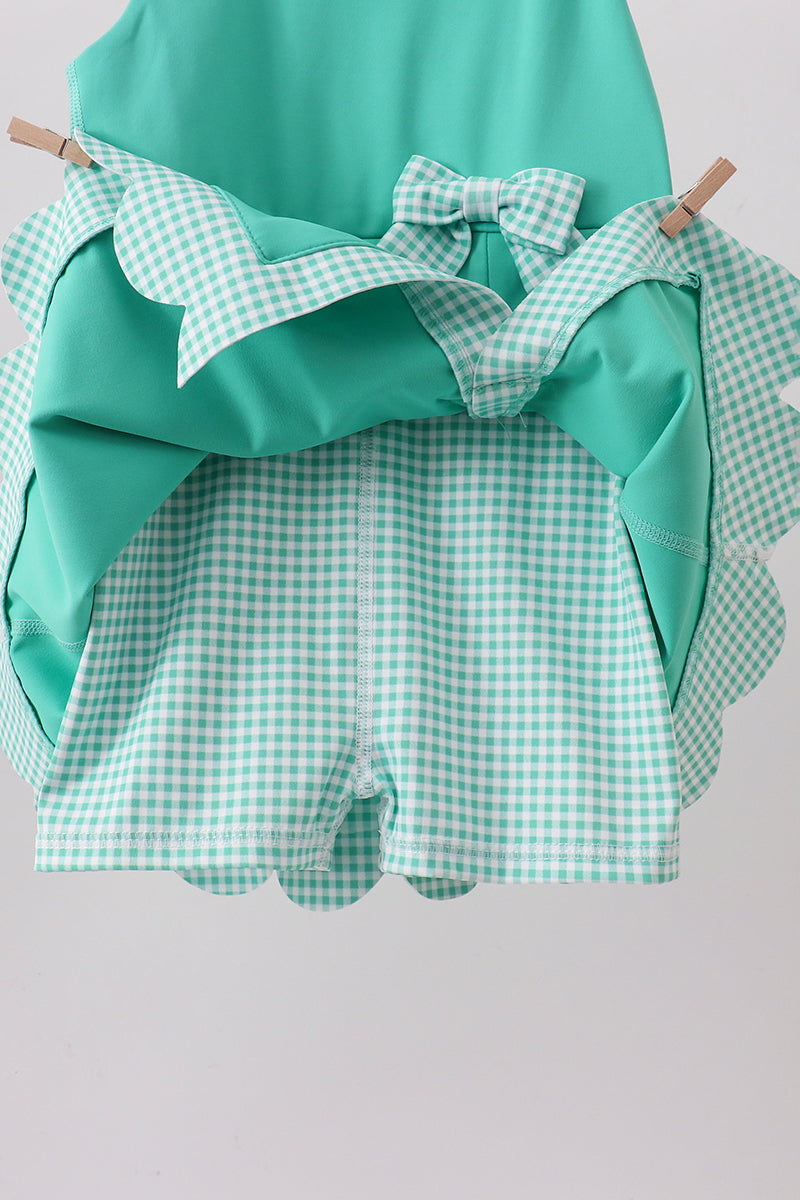 Green scalloped bow active dress