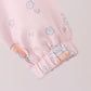 Pink pumpkin print ruffle coat