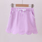 Purple scallop hem bow skort