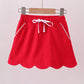 Red scallop hem bow skort