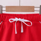 Red scallop hem bow skort