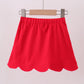 Red scallop hem bow skort