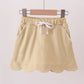 Khaki scallop hem bow skort