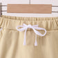 Khaki scallop hem bow skort