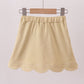 Khaki scallop hem bow skort