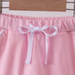 Pink scallop hem bow skort