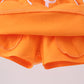 Orange scallop hem bow skort