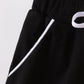 Black scallop hem bow skort