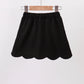 Black scallop hem bow skort