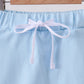 Mint scallop hem bow skort
