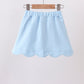 Mint scallop hem bow skort