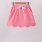 Deep pink scallop hem bow skort