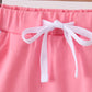 Deep pink scallop hem bow skort