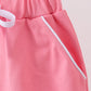 Deep pink scallop hem bow skort