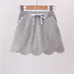 Grey scallop hem bow skort