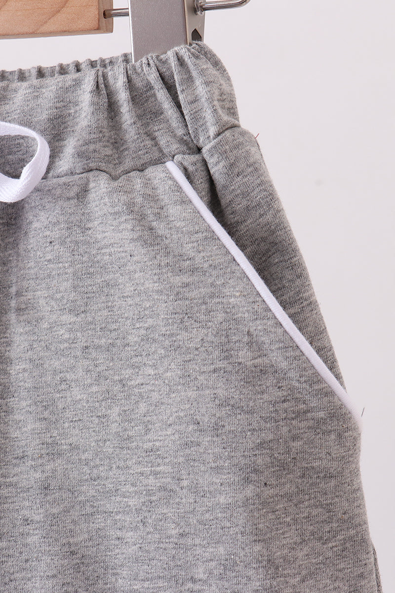 Grey scallop hem bow skort