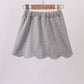 Grey scallop hem bow skort