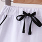 Snow white scallop hem bow skort