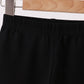 Black ruffle pants