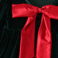Green velvet bow dress
