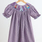 Purple castle hand smocked gingham dress