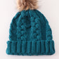 Teal pompom cable beanie hat