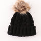 Black pompom cable beanie hat