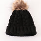 Black pompom cable beanie hat