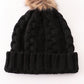 Black pompom cable beanie hat