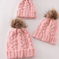 Pink pompom cable beanie hat