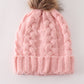 Pink pompom cable beanie hat