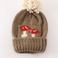 Brown pompom mushroom cable beanie hat