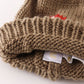 Brown pompom mushroom cable beanie hat