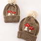 Brown pompom mushroom cable beanie hat