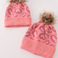 Pink pompom leopard cable beanie hat