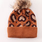 Brown pompom leopard cable beanie hat
