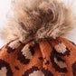 Brown pompom leopard cable beanie hat