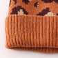 Brown pompom leopard cable beanie hat